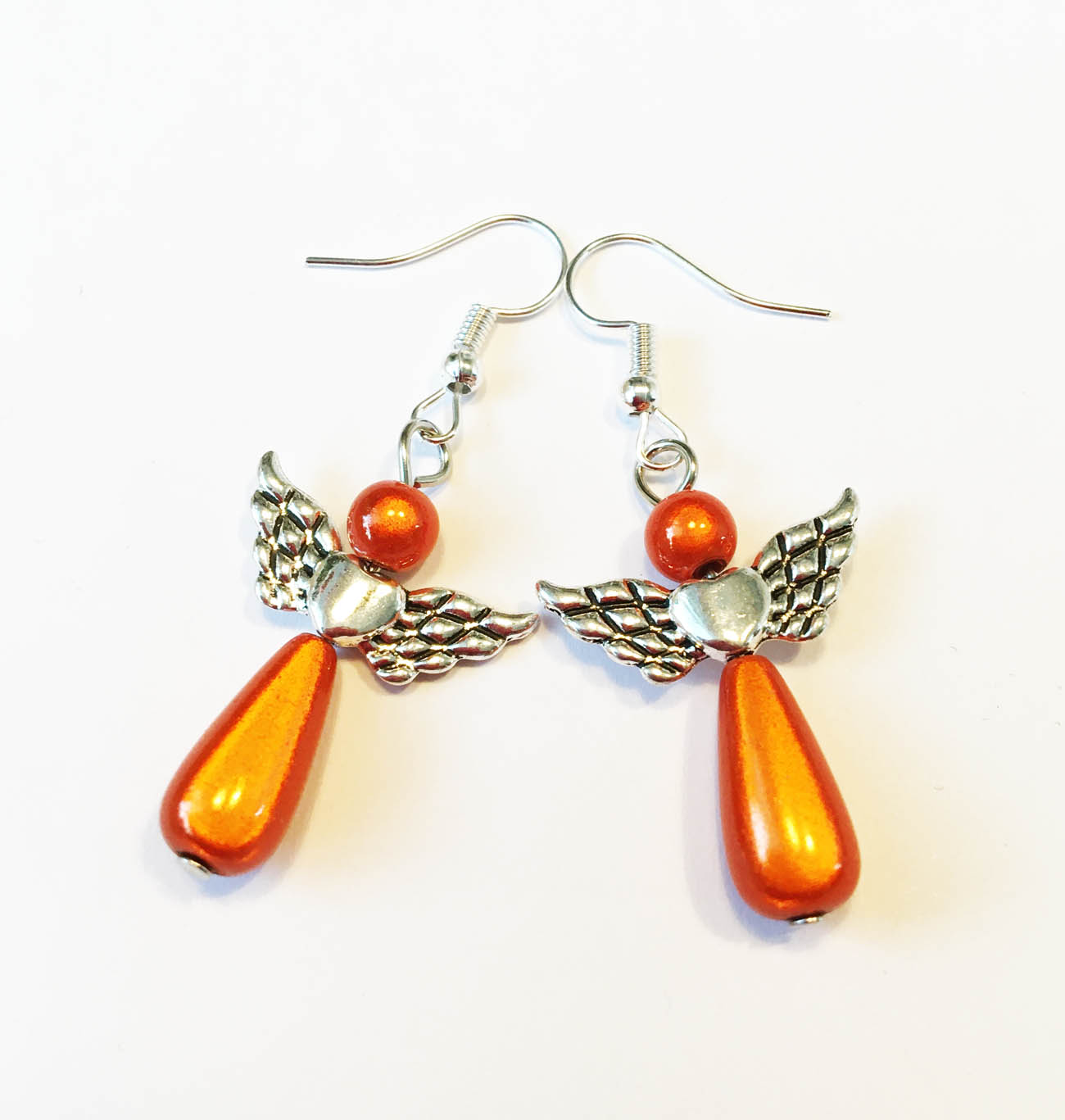 Elegantné korálkové náušnice - oranžové anjeliky